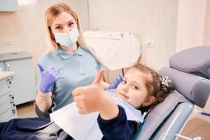 una niña a proposito de Caries en niños